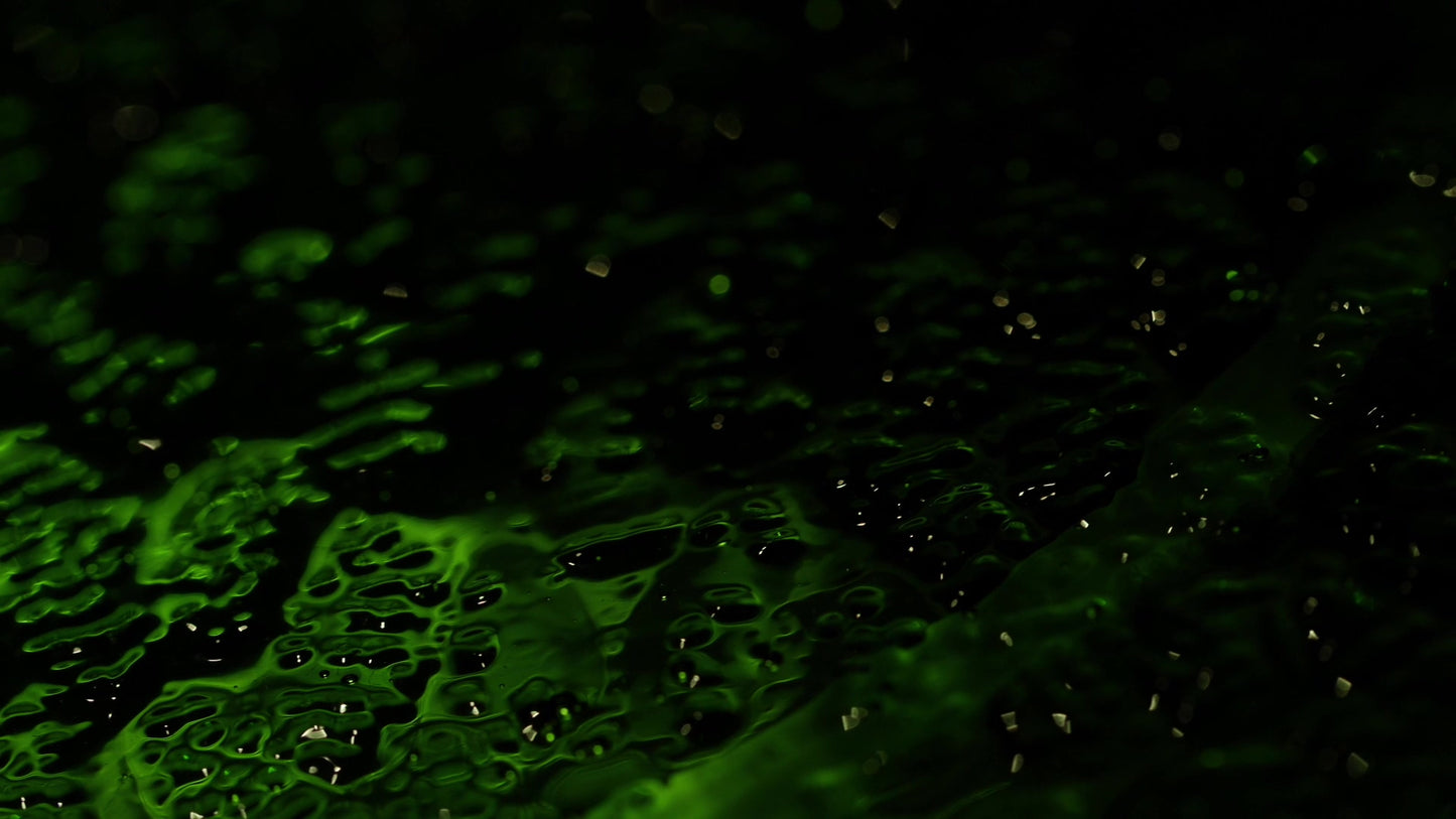 Glass Surface Green Sparks